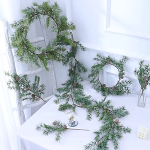 Christmas pine wreath and garland set with realistic pinecones for festive home decor