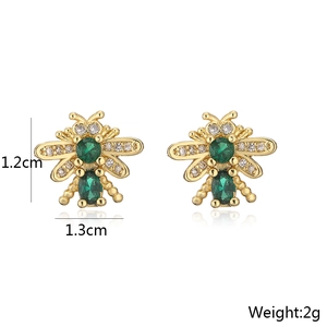 Detailed view of 18K gold plated bee earring with green zircon and clear crystals