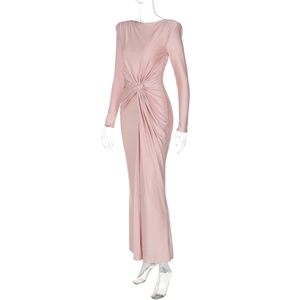 Detail of pink slim-fit evening gown showing the knotted waist twist and elastic knit fabric
