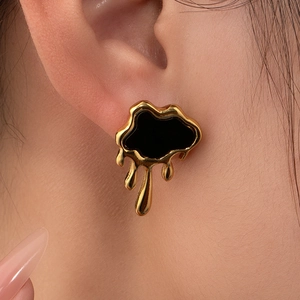 Elegant gold liquid-style irregular stud earrings with black enamel for women
