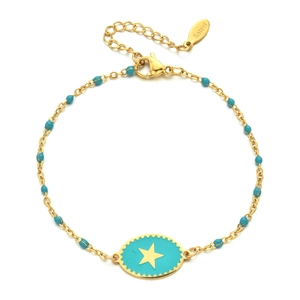 Detailed close-up of golden stainless steel star bracelet with green enamel pendant