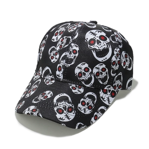 Detail of baseball cap with red-eyed skull pattern and durable canvas stitching