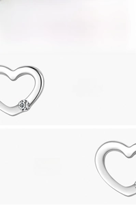 Detailed macro view of S925 sterling silver heart earring with 5A grade zircon stone