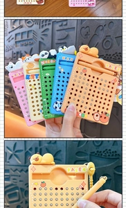 Detail of colorful mini magnetic ball drawing board keychains with cute animal toppers