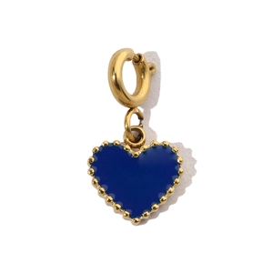 Detail of blue heart pendant earring with gold beads on a gold-plated stainless steel hoop