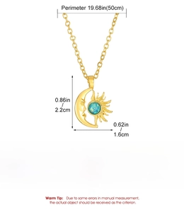 Detail view of gold moon and sun pendant necklace with dimensions and weight specs