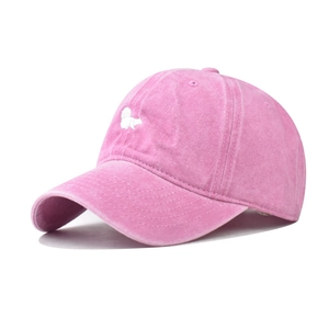 Close-up of cute white squirrel embroidery on pink washed cotton baseball cap