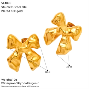 Detailed view of 18k gold plated stainless steel bow earrings with size specifications
