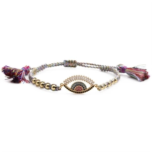 Bohemian woven bracelet with evil eye charm and adjustable colorful string cords