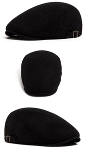 Detail view of textured twill fabric and adjustable leather strap with metal buckle