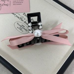 Elegant black hair claw with pink silk bow, white pearl, and heart rhinestones