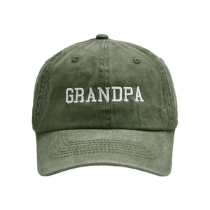 Macro detail of white GRANDPA embroidery on dark army green washed cotton baseball cap