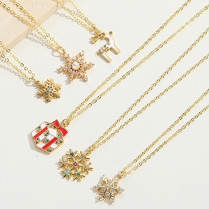 Exquisite gold Christmas necklace set featuring snowflake, reindeer, and gift box pendants