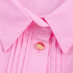 Close-up of pink poplin midi dress collar with elegant gold buttons and fine stitching