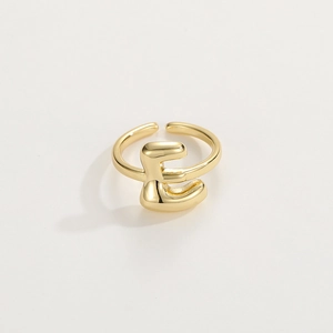 Detailed view of adjustable 18K gold plated ring featuring a 3D letter E design