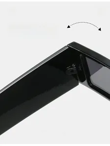 Macro shot of durable metal hinge detail on black rectangular fashion sunglasses