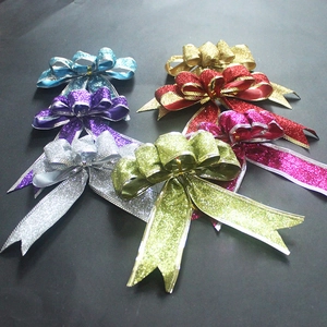 Colorful glitter bows with gold and silver edges for Christmas tree decoration