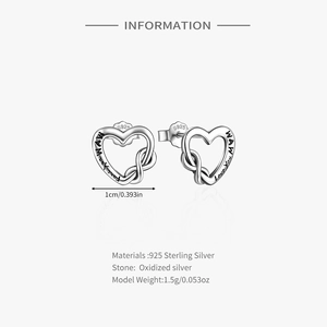 Detailed macro view of S925 sterling silver heart earrings with MUM and Infinity engraving