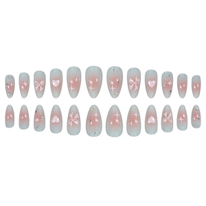 Almond press-on nails with pink-blue gradient, heart and bow patterns and small rhinestones