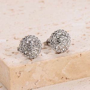 Classic silver metal round stud earrings with pave-set clear crystals on a stone base