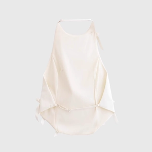 Elegant white halter top with bow decoration for women in a minimalist fashion design