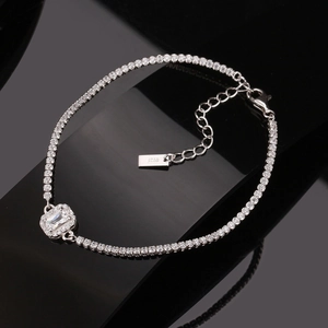 Detail of S925 sterling silver bracelet with rectangle zircon and lobster clasp on black background