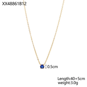 Detail of gold necklace with blue gemstone pendant including length and weight specs
