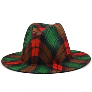 Detail of red and green plaid wool felt fedora hat featuring classic indented crown top
