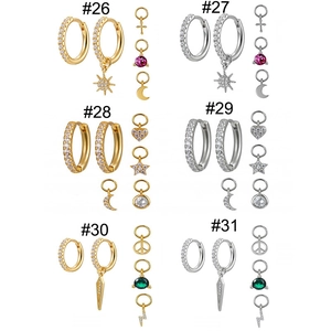 Gold and silver stacking earring sets with colorful heart and star charms