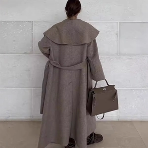 Women's double-faced camel wool coat with large shawl collar and waist belt back view
