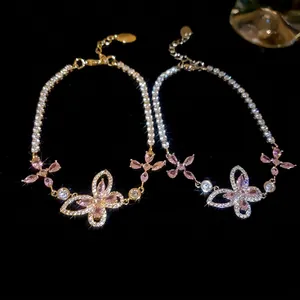 Pink zircon butterfly flower bracelets in gold and silver finish with adjustable lobster clasp