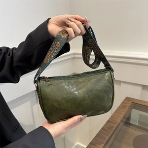 Green soft leather large capacity shoulder bag with a vintage patterned wide strap