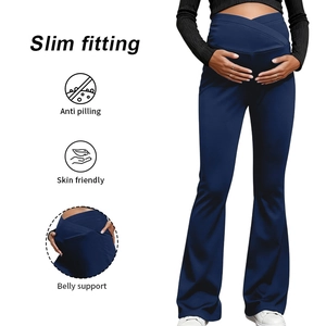 Detail of navy maternity yoga pants featuring V-shaped belly support and slim fit flare