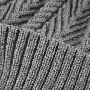 Women's thick grey jacquard knit beanie featuring cable knit texture and ribbed edge