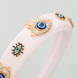 Cerchietto largo in raso rosa con decorazioni occhio del male e cristalli dorati