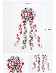 Detail of Christmas tree topper bow with red reindeer print and plaid burlap layers