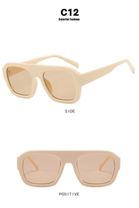 Detail view of beige square oversized sunglasses with light brown lenses and C12 model mark