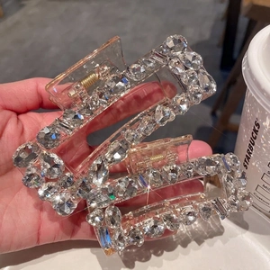 Sparkling crystal hair claw clip with rhinestones for elegant updo hairstyles