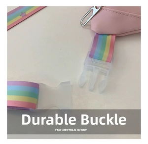 Detail of durable translucent buckle and colorful rainbow strap on pink kids chest bag