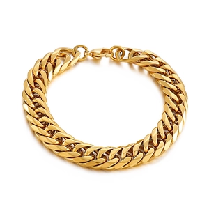 Polished gold curb chain bracelet with secure lobster clasp on white background