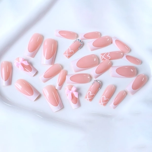 French white tip press-on nails with pink 3D bows and heart patterns on silk cloth