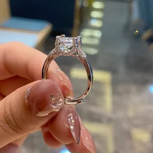 Close-up of sparkling square halo diamond ring with an adjustable silver band