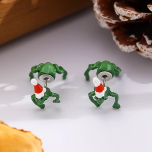 Detailed 45-degree view of green frog earrings with red Santa hats for Christmas
