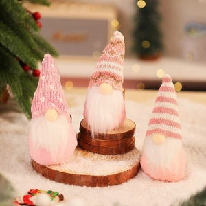 Pink and white knitted Christmas gnome plush figurines for holiday tree decoration