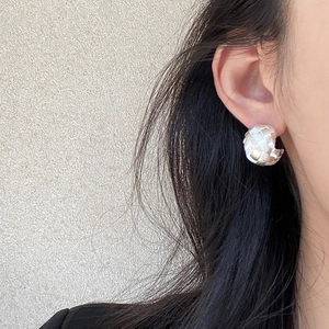 Chic silver woven C-shaped hoop earrings for women with textured metal design