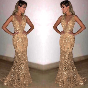Elegant champagne gold sequin mermaid evening dress with a sexy deep V-neckline