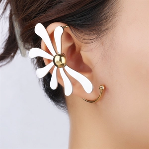 Floral petal ear cuff in silver and gold dual-tone plating worn on female ear