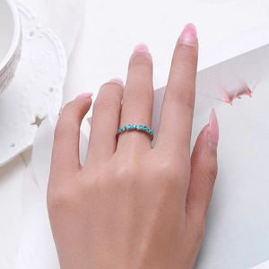 S925 sterling silver ring featuring seven marquise-cut turquoise stones on woman's hand