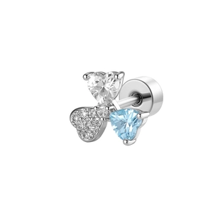 Silver clover stud earring with blue and white zircons on a white background