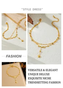 Detailed view of a gold-plated double-layer MOM anklet with heart pendant and crystals